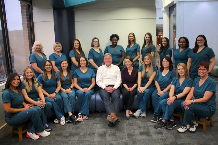 Group photo of a pediatric dental team in Austin, Texas
